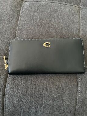 Coach Black Leather Zip-Around Wallet with Gold 'C' Accent